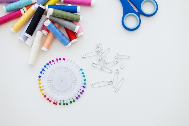 Assorted embroidery threads and tools